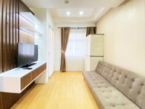 Minimalist Designed 2BR at Grand Asia Afrika Apartment By Travelio